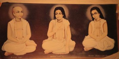 On the left in Srila Narottam das Thakur. In the middle is Srinivas Acarya. On the right is Syamananda pandit. I bow down to their lotus feet and beg their permission to continue their missionary activities within this world. *